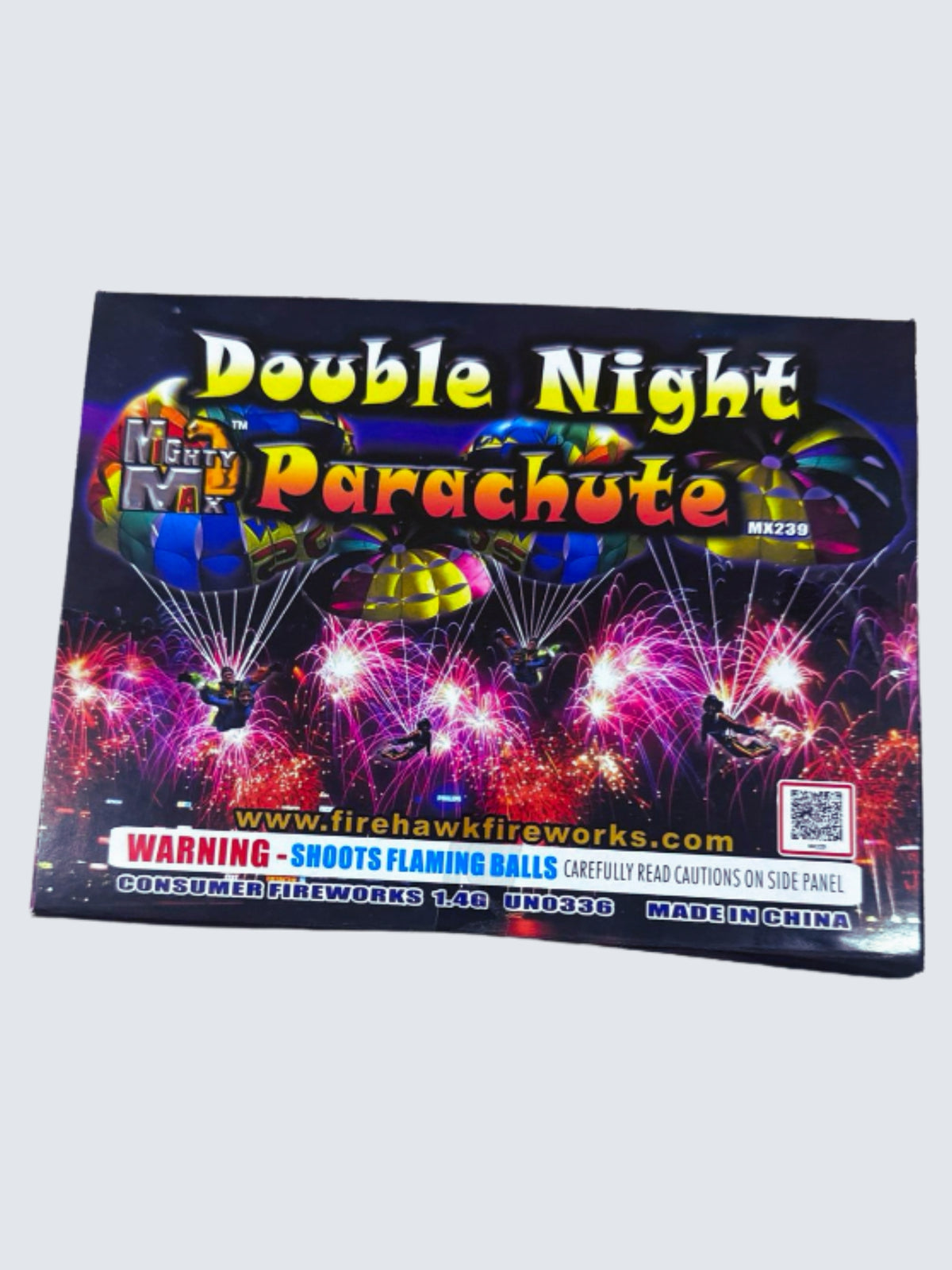 Double Night Parachute fireworks by Mighty Max, featuring colorful parachutes descending over vibrant pink fireworks bursts.