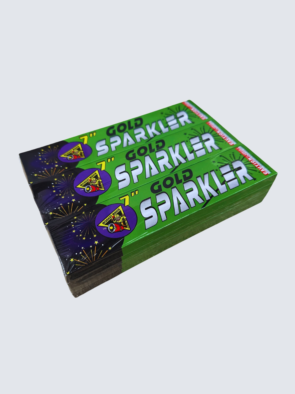 7-inch Gold Sparkler fireworks by Monkey Mania, featuring green packaging with purple accents and golden firework sparks.