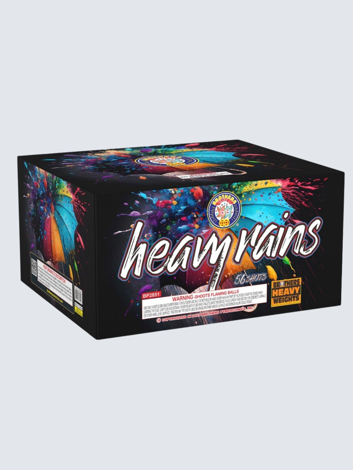 Heavy Rains 36-shot aerial repeater by Brothers Fireworks, featuring black packaging with vibrant rainbow paint splashes.